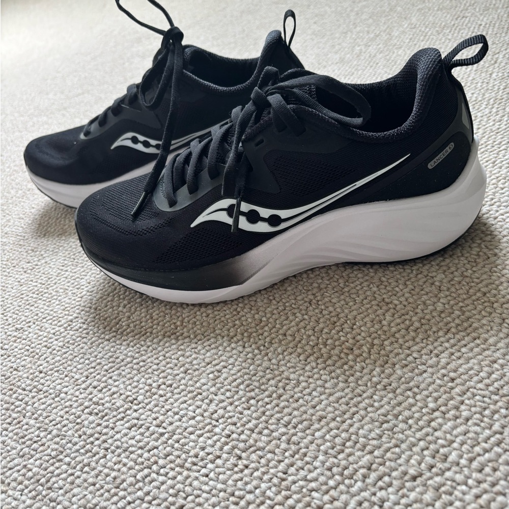 Saucony Lancer Black and White women’s athletic shoe